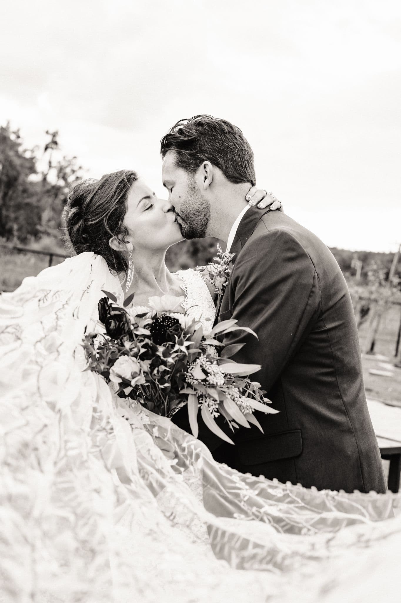 Happy couple laughing together on their wedding day
